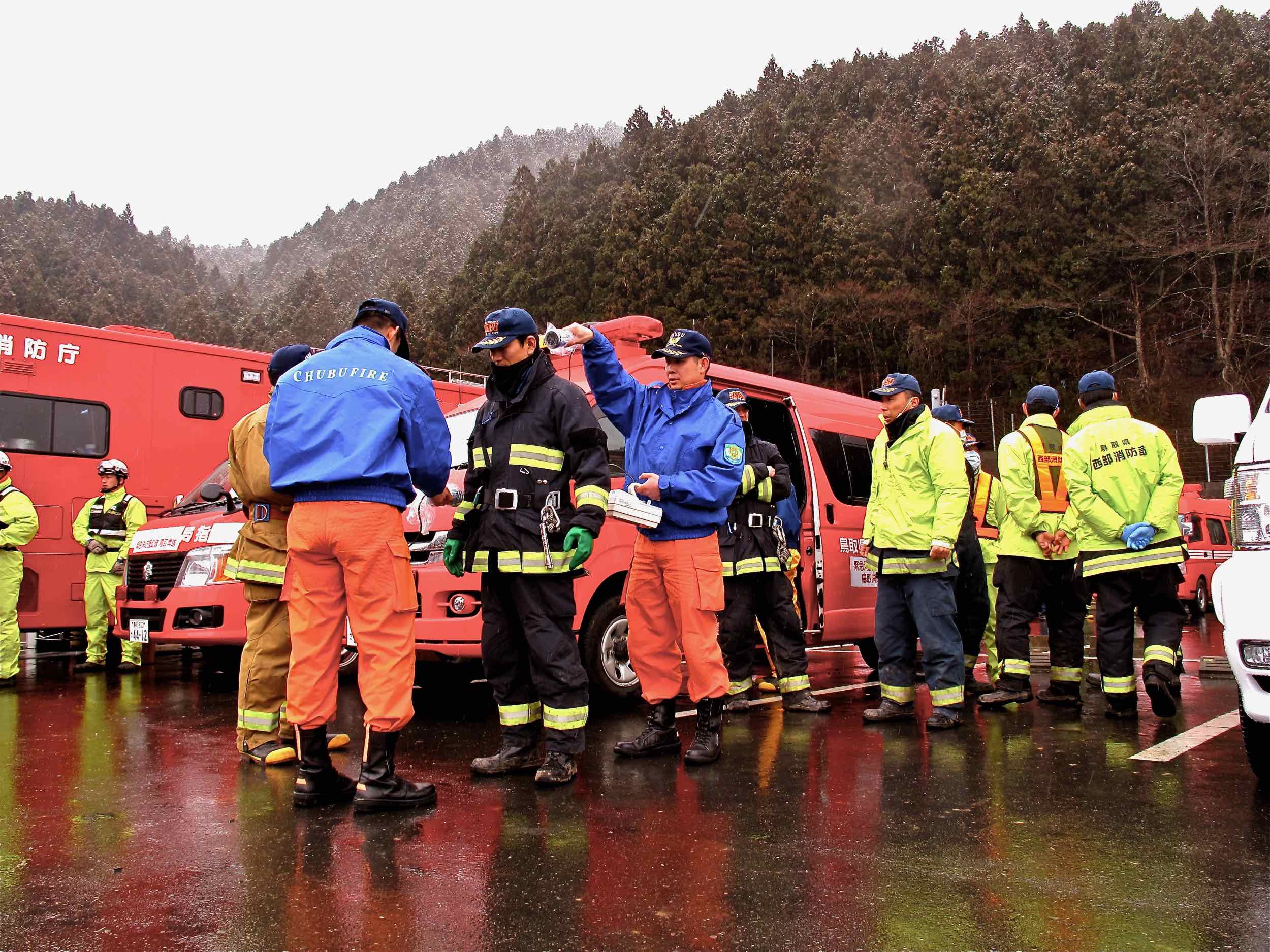  3/15 newly arrived fire brigades checking radiation, staging area for Minami Sanriku operations 